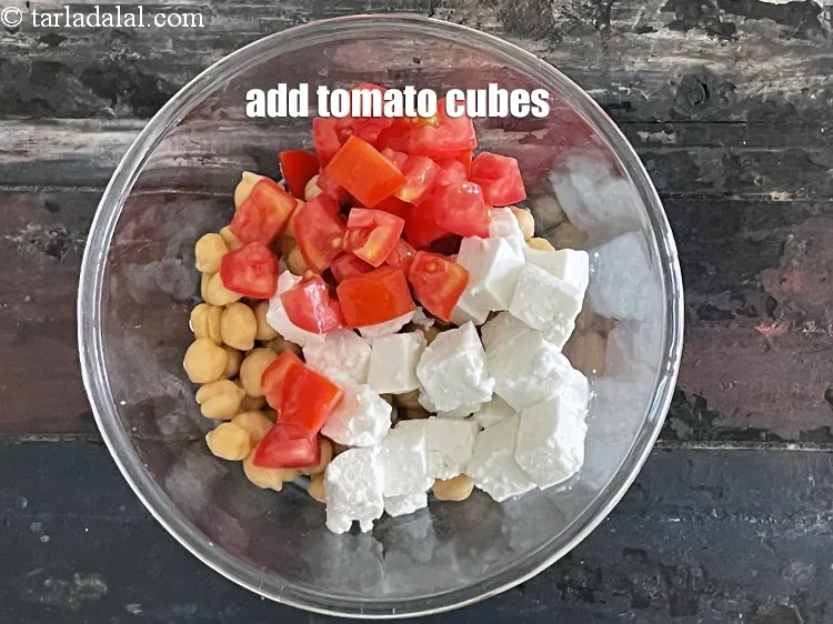Step 26 – Add&nbsp;<meta charset="UTF-8" />1/2 cup&nbsp;<a href="glossary-tomato-cubes-728i">tomato cubes</a>.