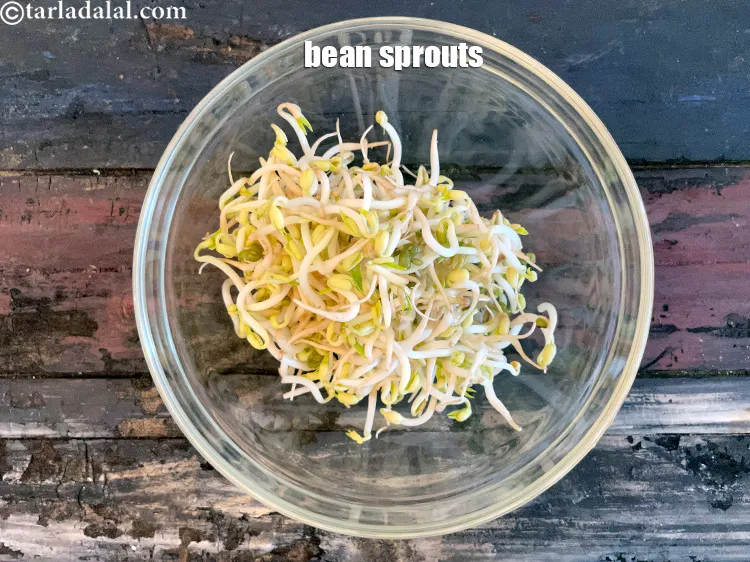 Step 18 – In a deep glass bowl put&nbsp;<meta charset="UTF-8" />1 1/2 cups&nbsp;<a href="glossary-bean-sprouts-193i">bean sprouts</a>.