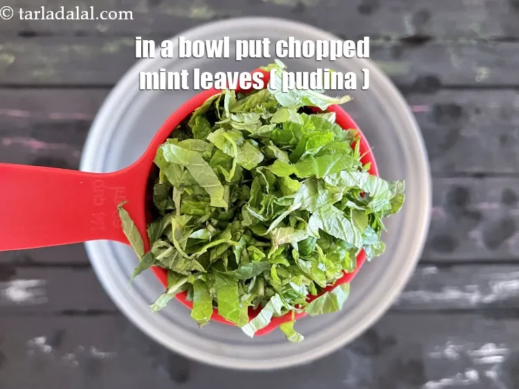 Step 15 – In a bowl put&nbsp;<meta charset="UTF-8" />1/2&nbsp;cup&nbsp;finely&nbsp;<a href="glossary-chopped-mint-788i">chopped mint leaves (phudina)</a>&nbsp;leaves.