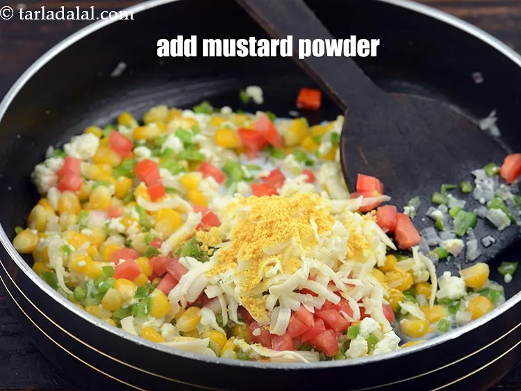 Step 14 – Add 1/2 tsp&nbsp;<a href="https://www.tarladalal.com/glossary-mustard-powder-rai-powder-sarson-powder-powdered-sarson-526i">mustard (rai / sarson) powder</a>.&nbsp;