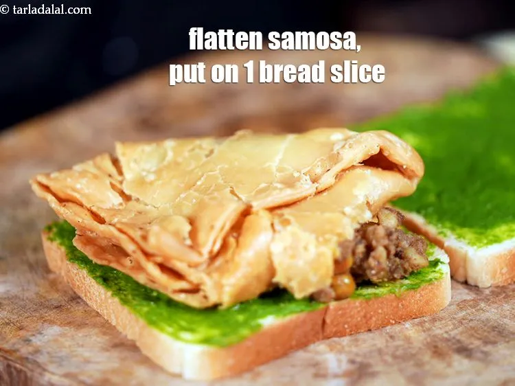 Step 16 – Flatten a <a href="https://www.tarladalal.com/samosas-37441r">samosas</a>, place it on one buttered-chutney bread slice.