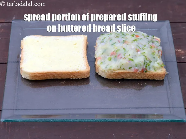 Step 14 – Spread a portion of the prepared stuffing on a buttered bread slice.