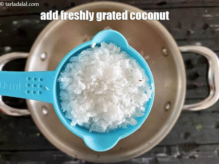 Step 15 – Add&nbsp;<meta charset="UTF-8" />1/2 cup&nbsp;freshly&nbsp;<a href="glossary-grated-coconut-852i">grated coconut</a>.