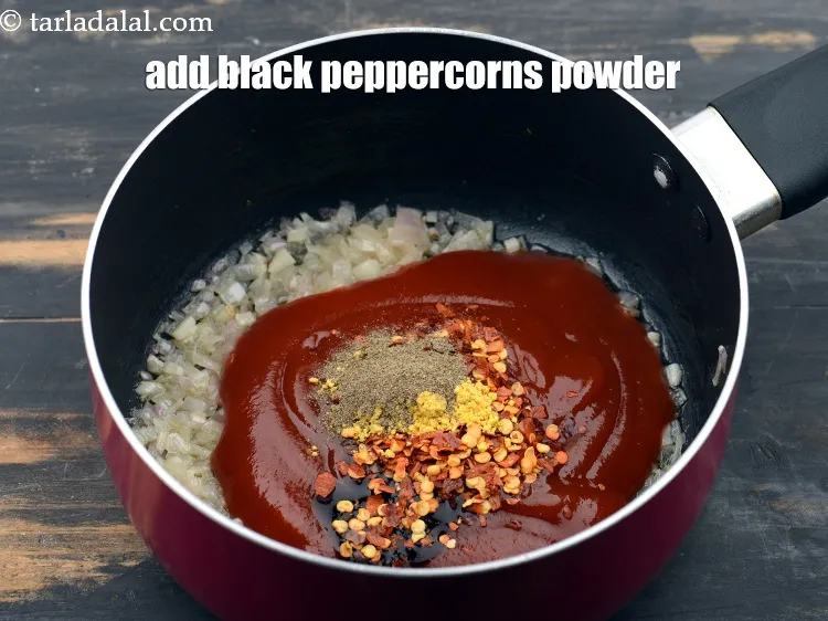Step 15 – Add 1/4 tsp&nbsp;<a href="https://www.tarladalal.com/glossary-black-peppercorns-kali-mirch-kalimirch-566i">black peppercorns (kalimirch)</a>&nbsp;powder.