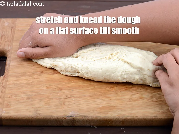 Step 14 – Stretch and knead the dough on a flat surface till smooth. This may take around …