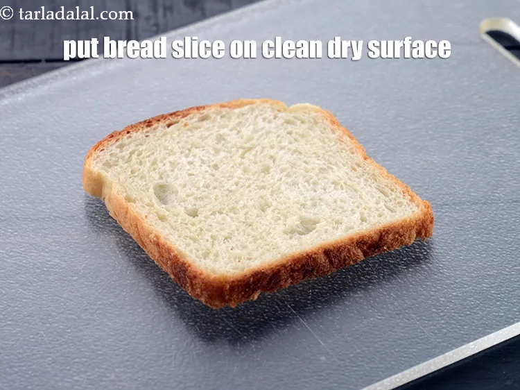 Step 14 – Take a slice of the bread on a clean dry surface.