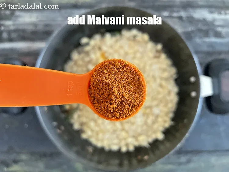Step 30 – Add&nbsp;1 tsp Malvani masala or&nbsp;<a href="https://tarladalal.com/glossary-chilli-powder-red-chilli-powder-339i">chilli powder</a>. Malvani masala is traditionally used by Maharashtrian households.