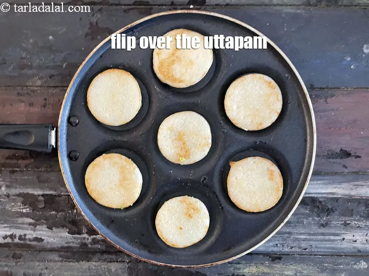 Step 27 – Flip over the uttpam.