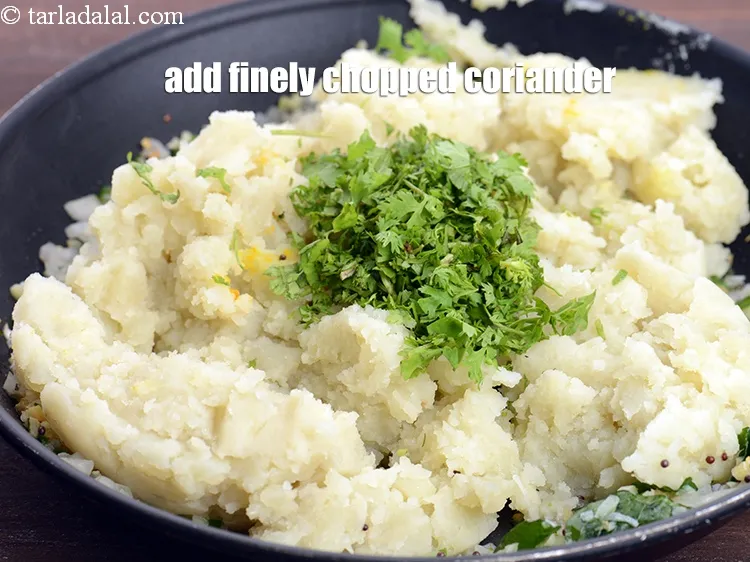 Step 16 – Add 1 tbsp finely <a href="https://www.tarladalal.com/glossary-chopped-coriander-783i">chopped coriander (dhania)</a>.