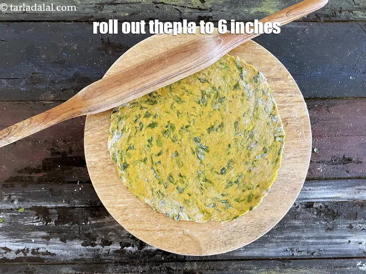 Step 14 – Roll out each portion into 150 mm. (6&quot;) diameter circle using a little whole wheat …