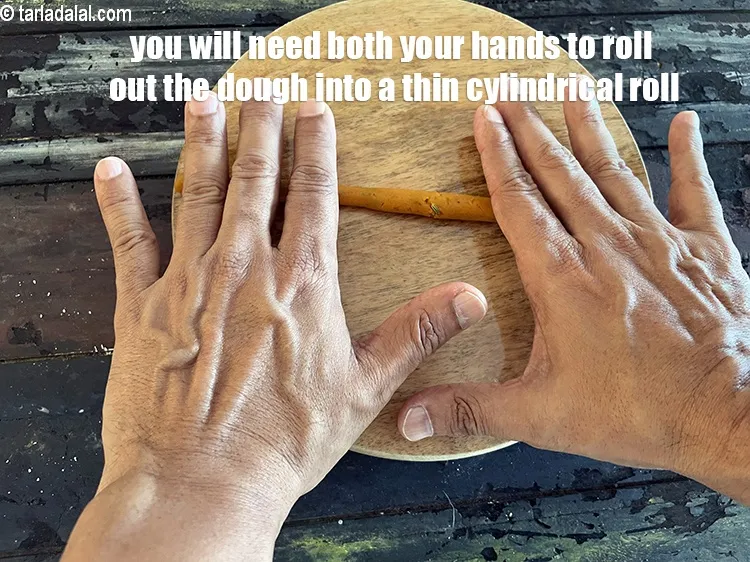 Step 14 – You will need to use both your hands to roll out the dough into a …