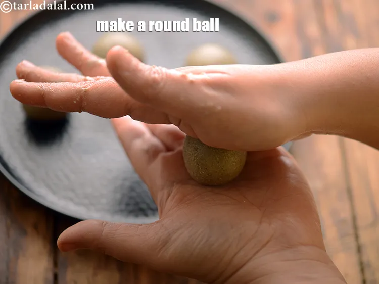Step 26 – Roll each portion into a round ball by shaping in between your palms.&nbsp;