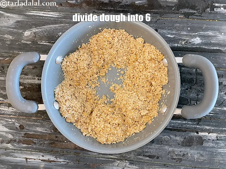 Step 19 – Keep aside to cool slightly for 2 minutes.&nbsp;Divide the mixture into 6 equal portions.