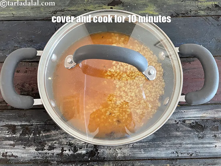 Step 26 – Cover with a lid and cook on a medium flame for 10 minutes, while stirring …