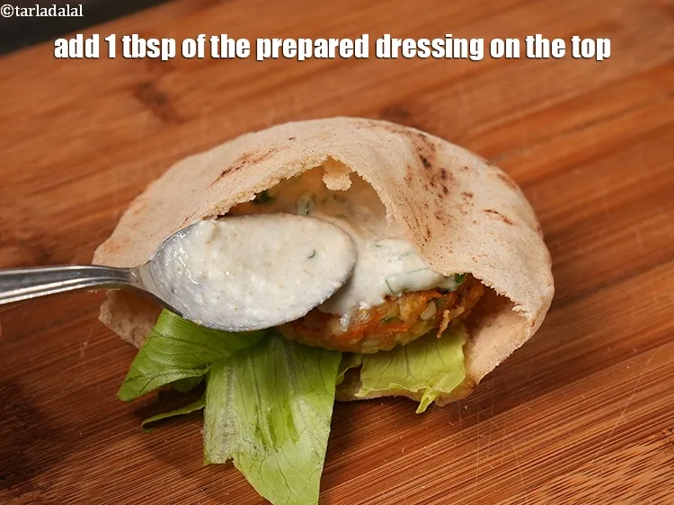 Step 35 – Add 1 tbsp of the prepared dressing on the top.