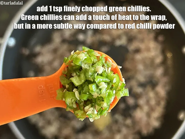Step 15 – Add <strong>1&nbsp;tsp</strong>&nbsp;finely&nbsp;<a href="glossary-chopped-green-chilli-820i">chopped green chillies</a>.&nbsp;Green chillies can add a touch of heat to the wrap, …