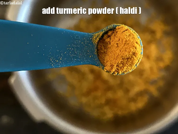Step 16 – Add&nbsp;<meta charset="UTF-8" />1/4 tsp&nbsp;<a href="glossary-turmeric-powder-haldi-645i">turmeric powder (haldi)</a>.