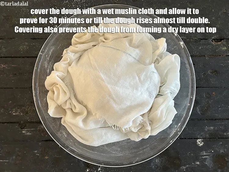 Step 16 – <meta charset="UTF-8" />Cover the dough with a wet muslin cloth and allow it to prove …
