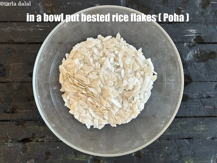 Step 15 – In a bowl put&nbsp;<meta charset="UTF-8" />1/2 cup&nbsp;<a href="glossary-beaten-rice-poha-rice-flakes-flaked-rice-536i">beaten rice flakes (poha)</a>.