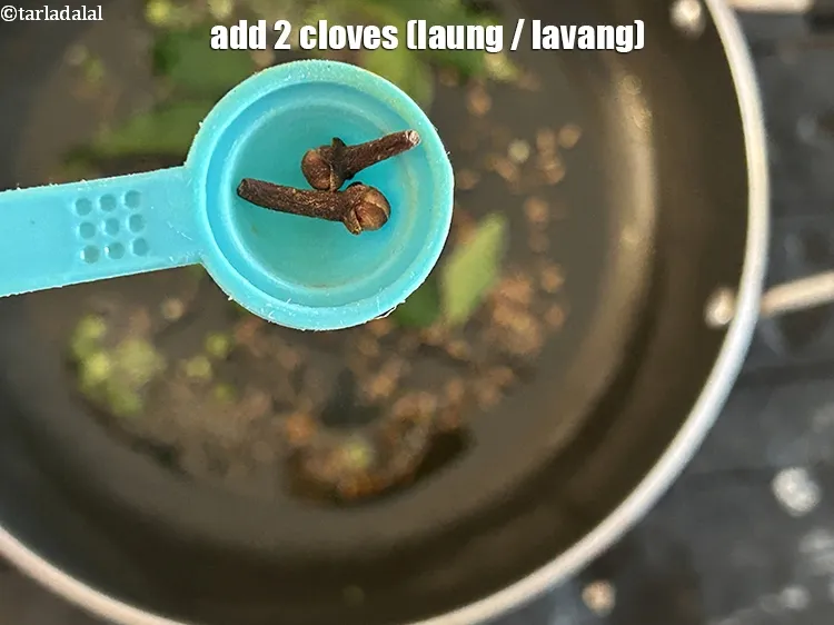 Step 15 – Add&nbsp;<meta charset="UTF-8" />2&nbsp;<a href="glossary-cloves-laung-lavang-322i">cloves (laung / lavang)</a>.