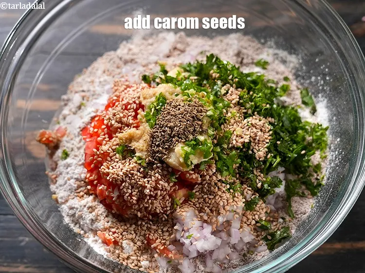 Step 15 – Add 1/2 tsp <a href="https://www.tarladalal.com/glossary-carom-seeds-ajwain-thymol-seeds-bishops-weed-266i">carom seeds (ajwain)</a>.