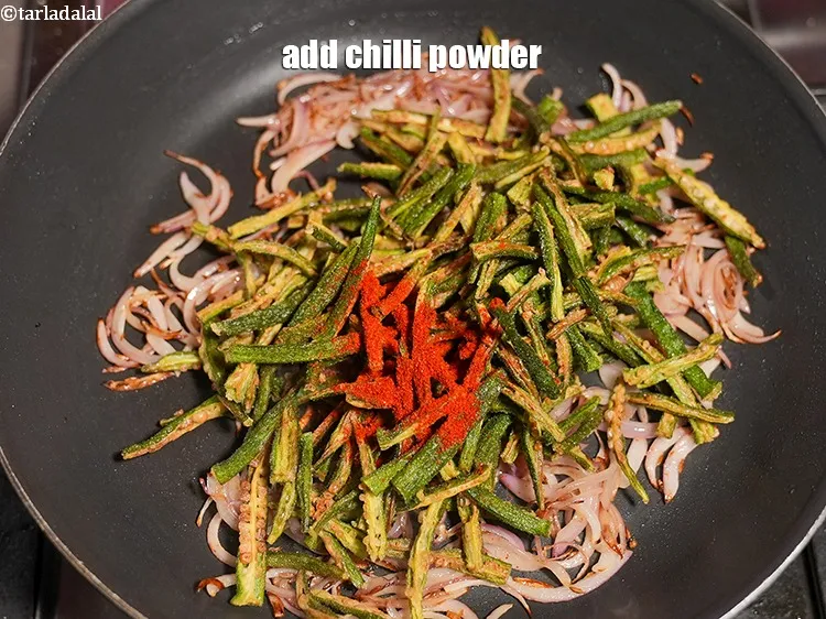 Step 15 – Add &frac12; tsp <a href="https://www.tarladalal.com/glossary-chilli-powder-red-chilli-powder-339i">chilli powder</a>.&nbsp;