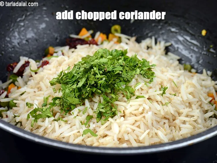 Step 33 – Add 1 tbsp&nbsp;<a href="https://www.tarladalal.com/glossary-chopped-coriander-783i">chopped coriander (dhania)</a>.