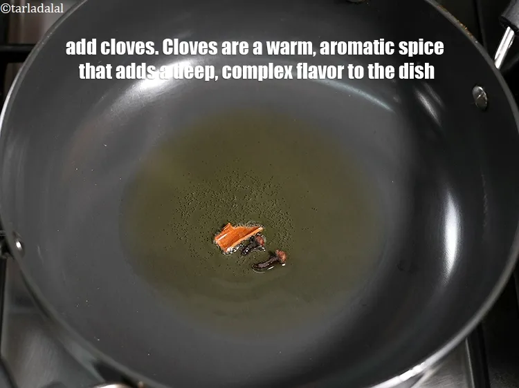 Step 16 – Add 2 <a href="https://www.tarladalal.com/glossary-cloves-laung-lavang-322i">cloves (laung / lavang)</a>. Cloves are a warm, aromatic spice that adds …