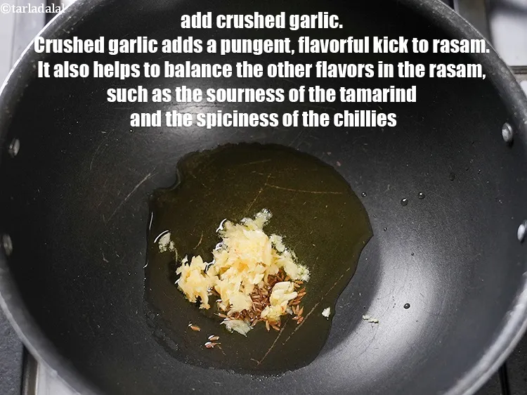 स्टेप 38 – २ टी-स्पून&nbsp;<a href=""https://www.tarladalal.com/glossary-crushed-garlic-hindi-870i"">कुटा हुआ लहसुन</a>&nbsp;डालें । लहसुन रसम में तीखा, …