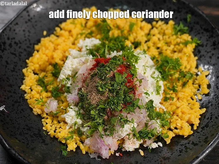 Step 17 – Add 2 tbsp finely&nbsp;<a href="https://www.tarladalal.com/glossary-chopped-coriander-783i">chopped coriander (dhania)</a>.&nbsp;