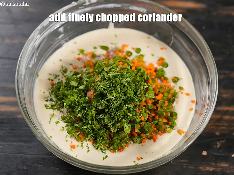 Step 16 – Add 2 tbsp finely <a href="https://www.tarladalal.com/glossary-chopped-coriander-783i">chopped coriander (dhania)</a>.