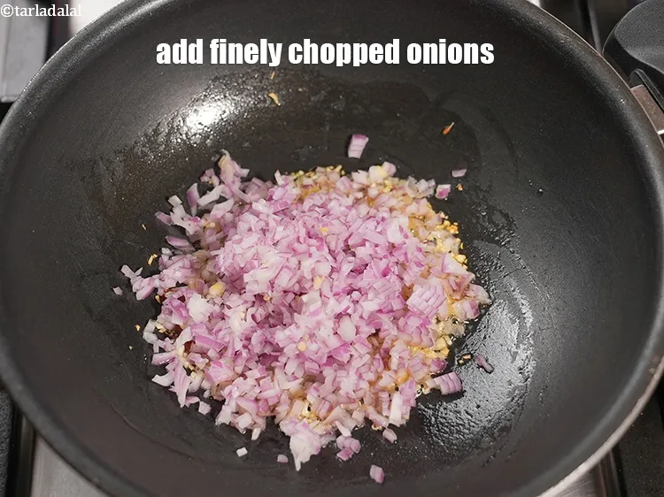 Step 15 – Add &frac12; cup finely&nbsp;<a href="https://www.tarladalal.com/glossary-chopped-onions-722i">chopped onions</a>.