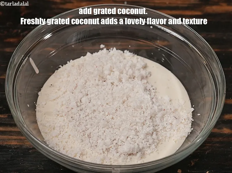 Step 15 – Add 1 cup <a href="https://www.tarladalal.com/glossary-grated-coconut-852i">grated coconut</a>. Freshly grated coconut adds a lovely flavor and texture.