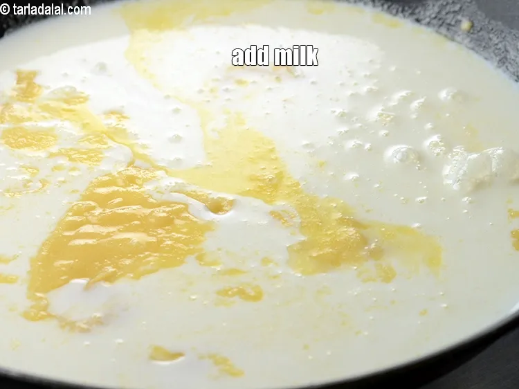 Step 16 – Add 2 &frac14; cup milk.&nbsp;