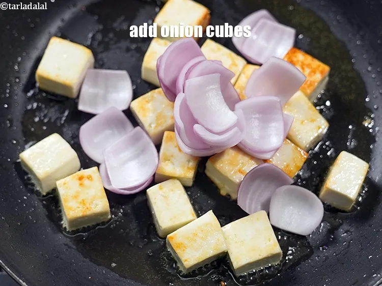 Step 16 – <p>Add ½ cup <a href="https://www.tarladalal.com/glossary-onion-cubes-732i">onion cubes</a>.</p>