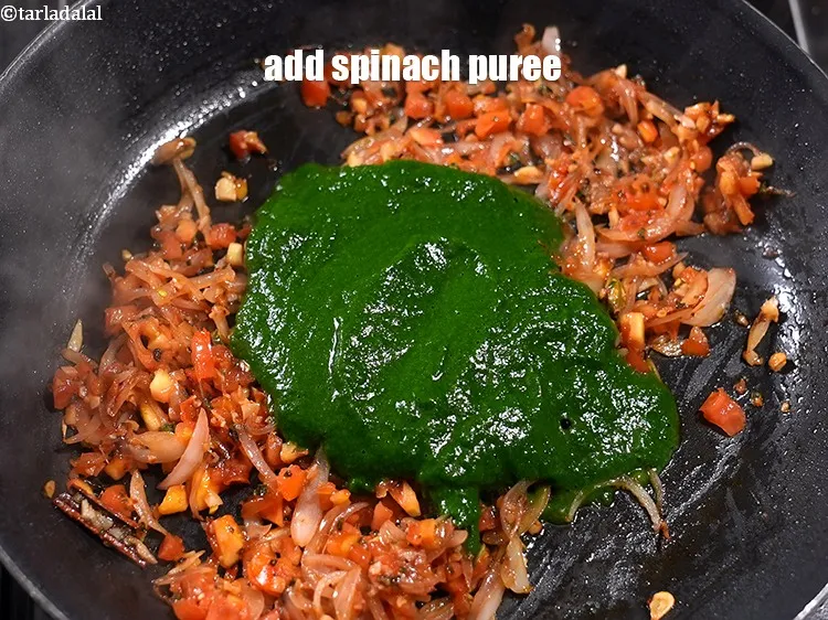 Step 19 – Add &frac34; cup <a href="https://www.tarladalal.com/glossary-spinach-puree-palak-ki-puree-256i">spinach (palak) puree</a>.