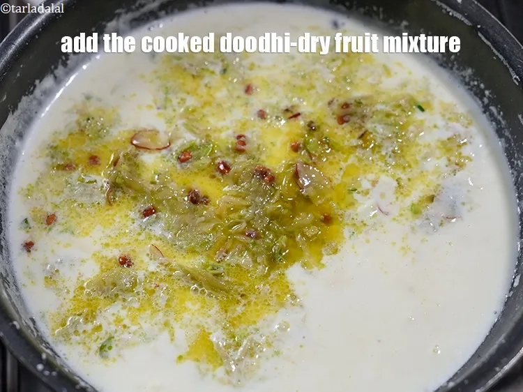 Step 15 – Add the cooked doodhi-dry fruit mixture.