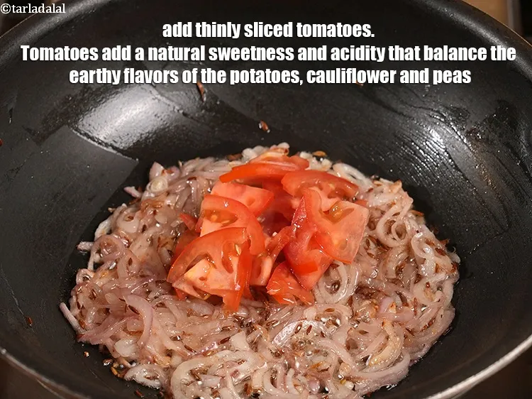 Step 15 – Add &frac14; cup thinly&nbsp;<a href="https://www.tarladalal.com/glossary-sliced-tomatoes-746i">sliced tomatoes</a>. Tomatoes add a natural sweetness and acidity that balance …
