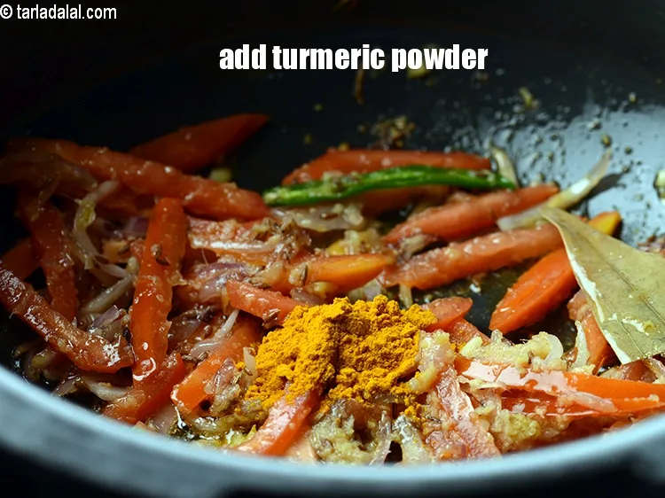 Step 15 – Add &frac12; tsp <a href="https://www.tarladalal.com/glossary-turmeric-powder-haldi-645i">turmeric powder (haldi)</a>.