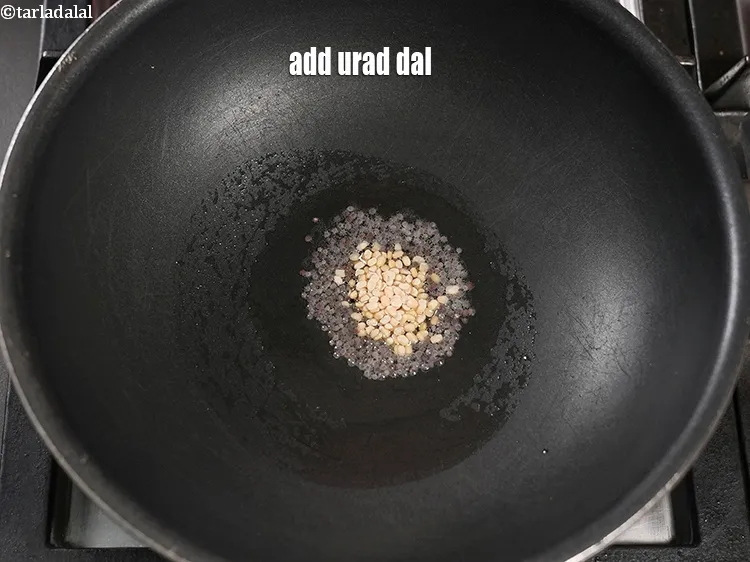 Step 15 – Add &frac12; tsp urad dal.&nbsp;