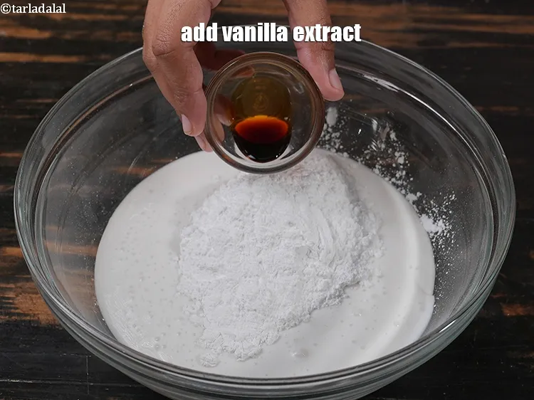 Step 15 – Add &frac12; tsp <a href="https://www.tarladalal.com/glossary-vanilla-extract-1248i">vanilla extract</a>.&nbsp;