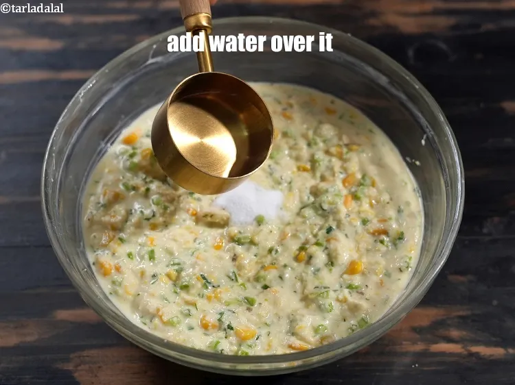 Step 15 – Add 2 tsp of water over it.