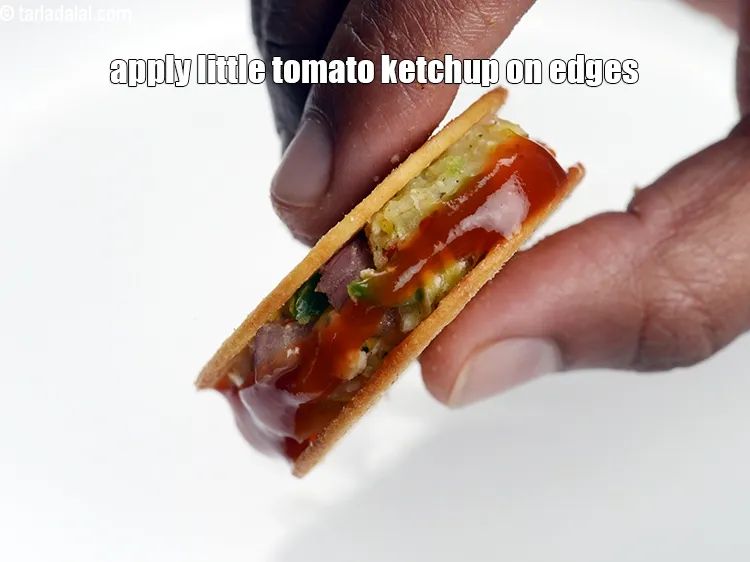 Step 15 – Apply little tomato ketchup on the edges.