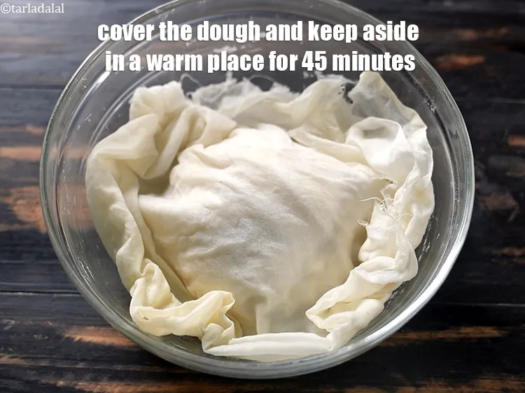 Step 15 – Cover the dough with a lid or damp muslin cloth and keep aside in a …