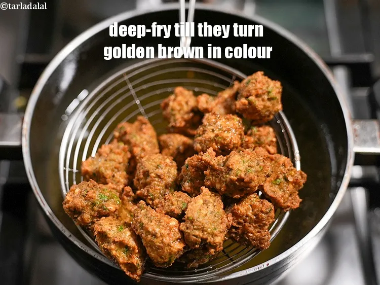 Step 15 – Deep-fry a few pakodas at a time on a medium flame till they turn golden …