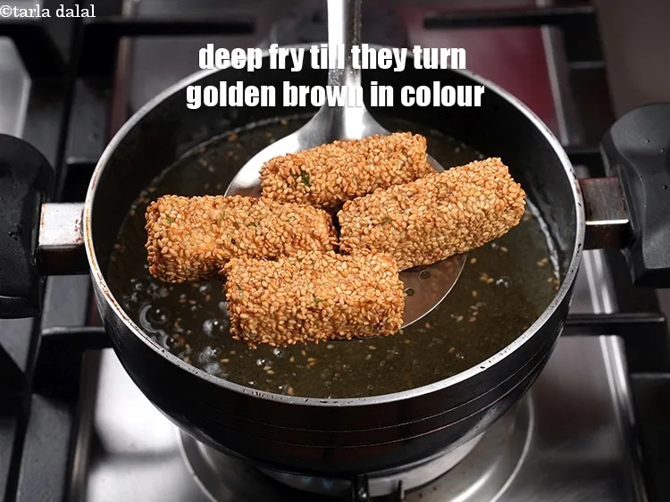 Step 15 – Deep fry them on a medium flame, till they turn golden brown in colour from …
