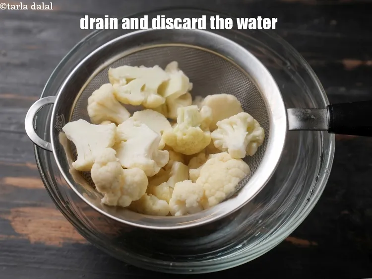 Step 14 – Drain the cauliflower and discard the water.