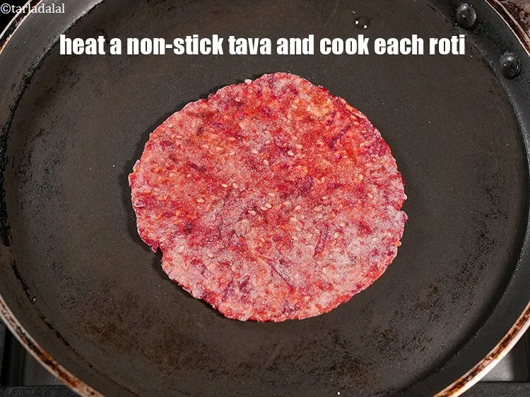 Step 15 – Heat a non-stick tava (griddle) and cook each roti.