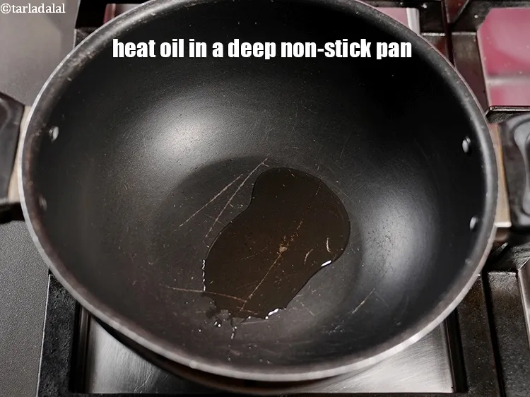 Step 15 – Heat 2 tsp oil in a deep non-stick pan.