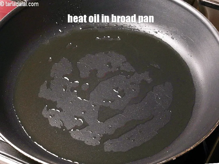 Step 16 – Heat 1 tbsp oil in a broad non-stick pan.